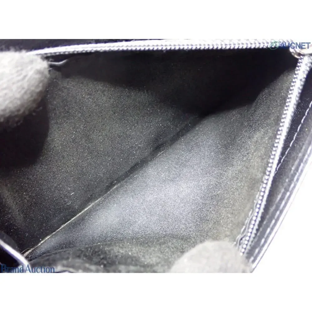 5909 - Chanel Matelasse Coco Button bi-fold wallet